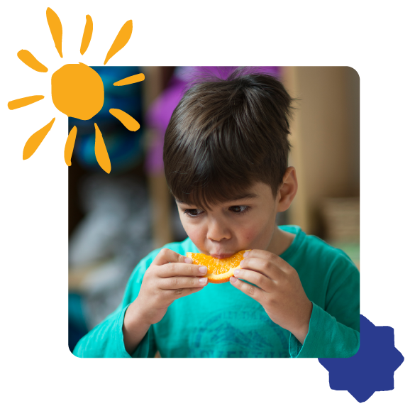 Child eating fresh fruit