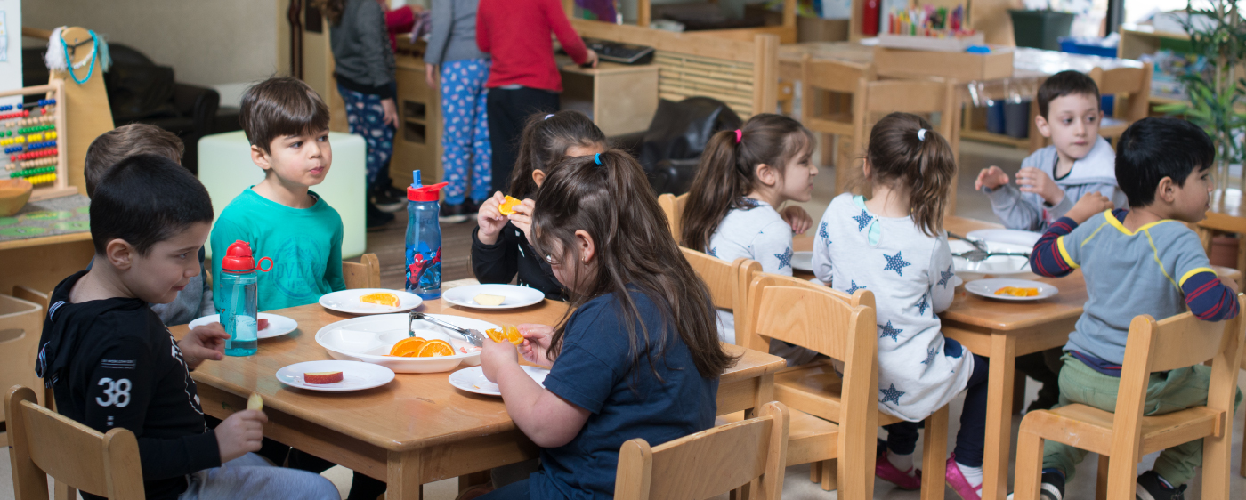 Children at work on a creative project in the Kinder Room