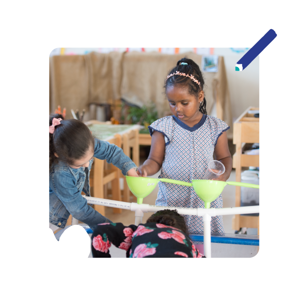 A naturally-lit Pre-Kinder classroom set up for hands-on exploration